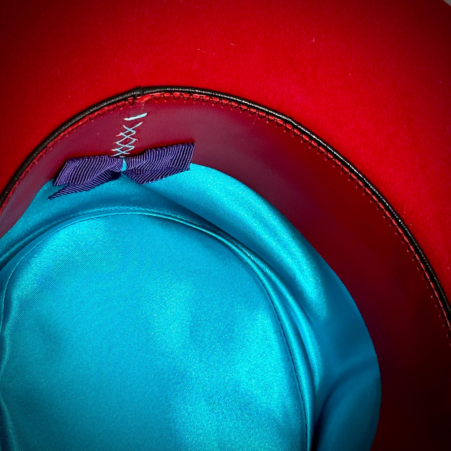 Scarlet Fedora Purple Bow and turquoise satin lining.