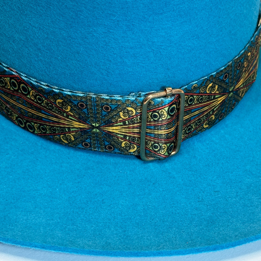 turquoise blue fedora buckle close up