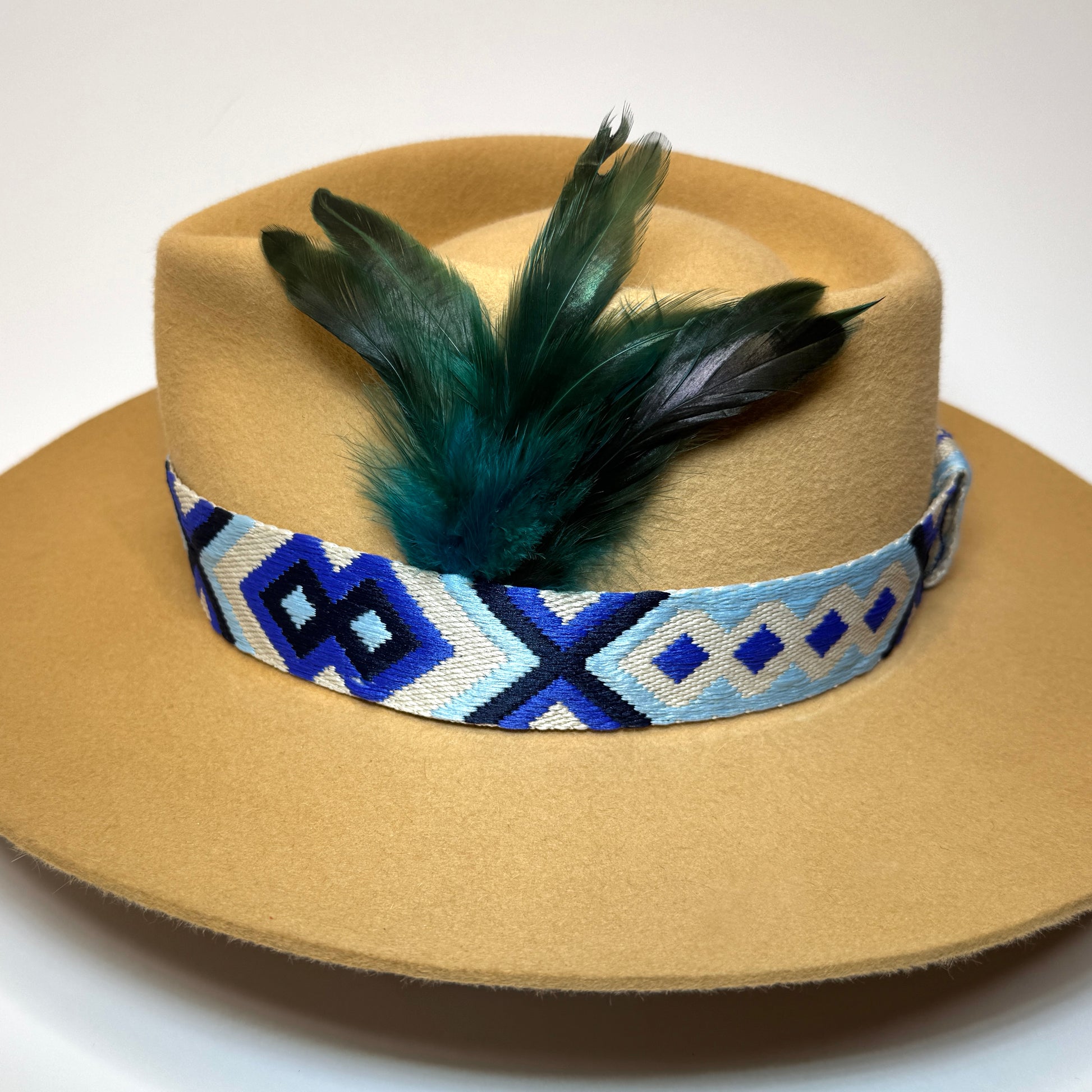 camel fedora, cockerel feathers